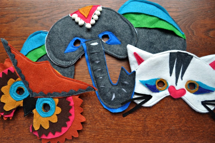 handmade owl, elephant, and cat masks